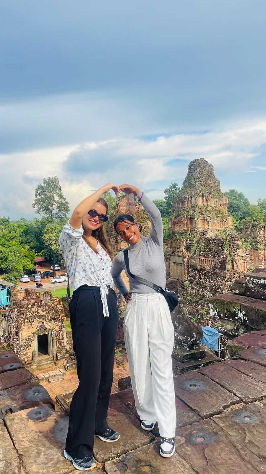 A picture in Angkor Wat with another volunteer at AHHA Education