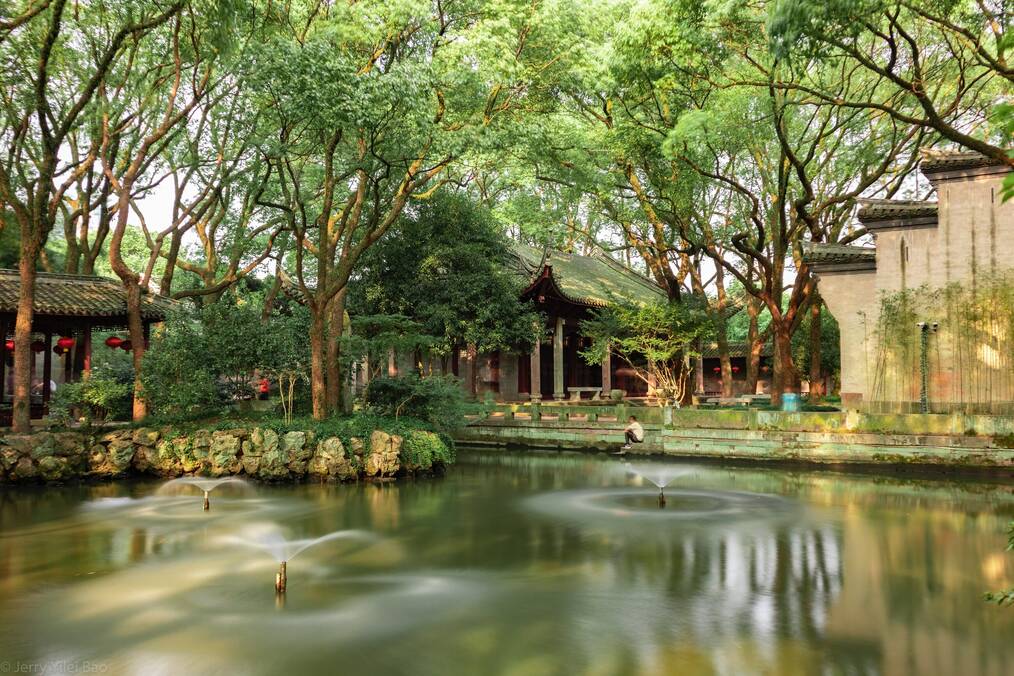 Buildings near a pond in Ningbo, China.