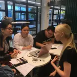 Business Interns from internship in china program having a project discussion