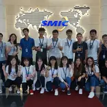 interns from internship in china program happily taking photos with co-workers in SMIC