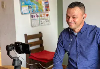 A Spanish Professor at Tico Lingo teaches an online Spanish class to a student in Canada