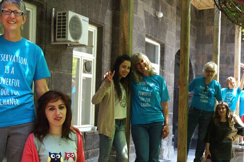AiP volunteers & museum staff work together
