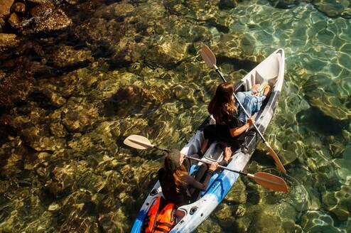 Kayaking to do snorkel survey