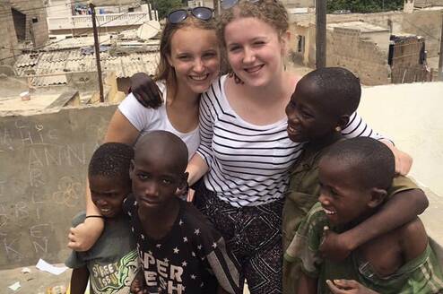 Care volunteers with the children