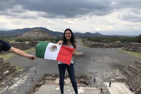 Girl holding Mexico flag