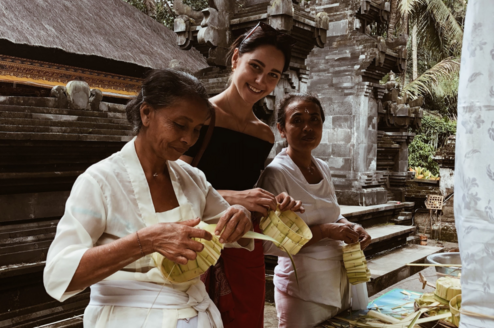 Volunteer learning to craft from locals