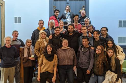 Students pose for a photo with the WESLI Teacher Training Program graduates