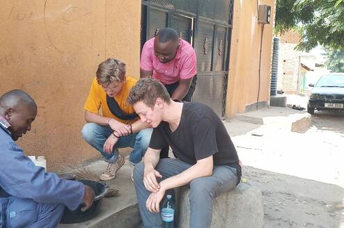Volunteers were learning how to make briquettes using char