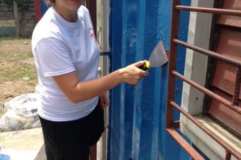 Volunteers doing building maintenance