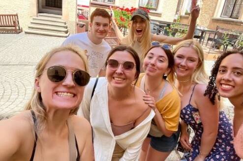 Students posing on street in Prague