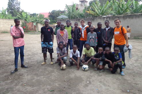 Our volunteers and players in a together photo