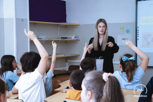 Meddeas Language Assistant with her students