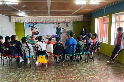 Volunteers teach children through a variety of programs.