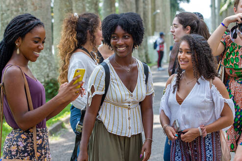 Students talking outside. 