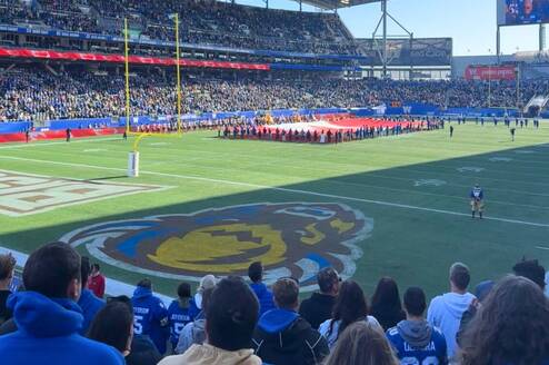International students attending a football game