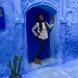 girl in blue doorway