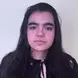 girl with long brown hair wearing black shirt