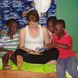 Ali reading to some of the local children