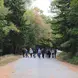 Luke and other program participants of Seguinland enjoying a walk on an autumn day