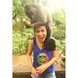 The boss monkey on my head. He almost broke my neck and I got a scratch on my face but he got his banana... It was amazing!