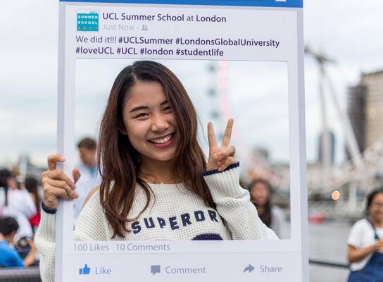 UCL Summer School student enjoying the End of Summer Boat Party on the River Thames
