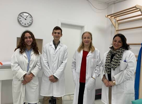 Medical intern learning alongside doctors during an international healthcare internship
