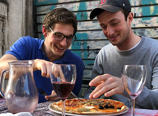 Study abroad students enjoy pizza in Rome