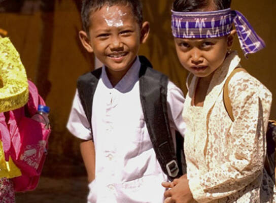 Two children going to school.