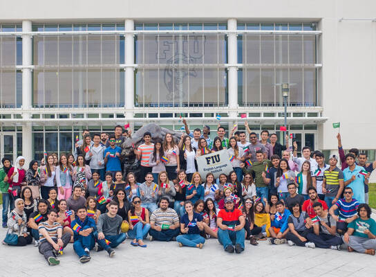 Group shot of FIU ELI students holding their country's flags.