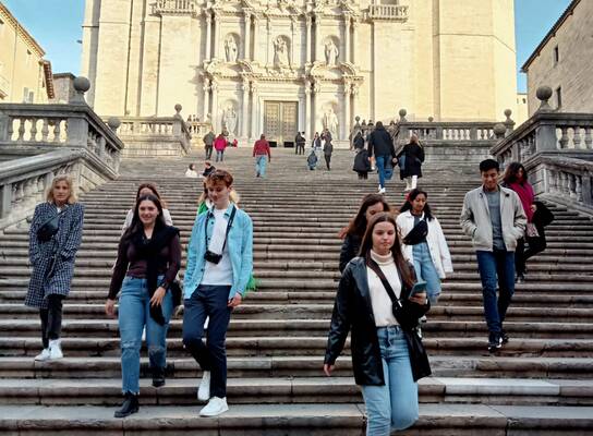 Students walking down stairs
