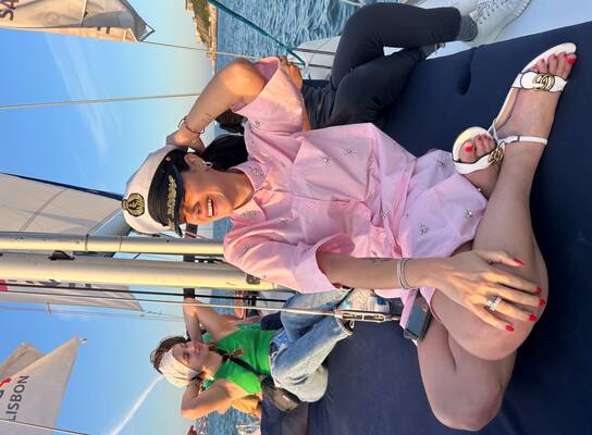 Students enjoying themselves on a sailboat in Lisbon, Portugal