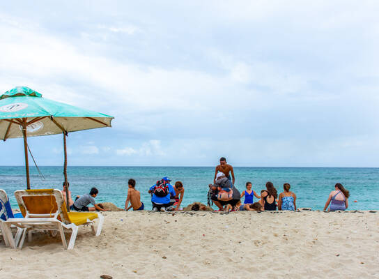 VISIONS Dominican Republic kids at the beach.