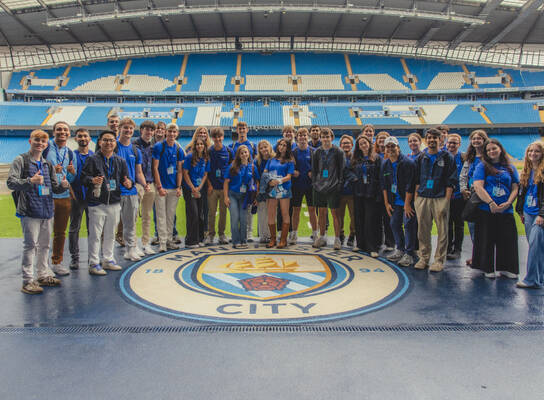 Students at the Etihad Stadium