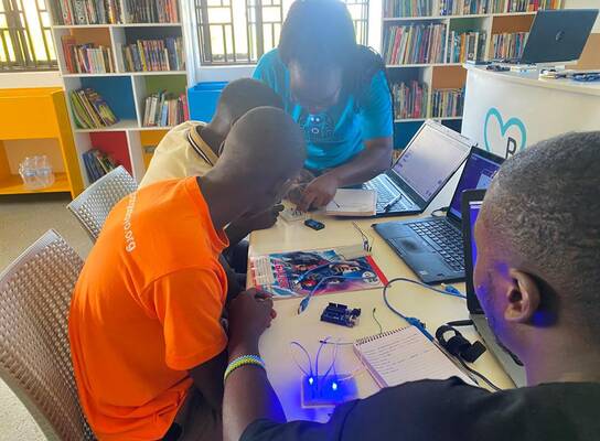 Youth parcticipating in robotics class