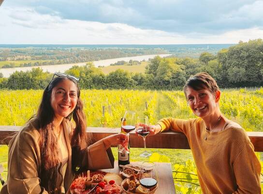 Enjoying at a vineyard restaurant while practicing French during an immersion experience in southwest France
