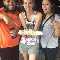 three students holding a marquesita