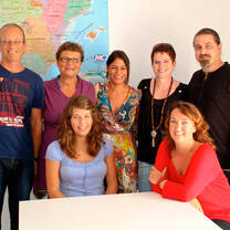 students in classroom with map