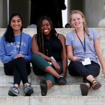 three girls sitting on steps 