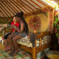 students sitting inside a Mongolian yurt