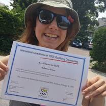 girl holding paper certification