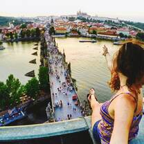 Language House student looking over Charles Bridge in Prague 