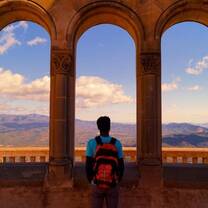 man looking out over the scenery 