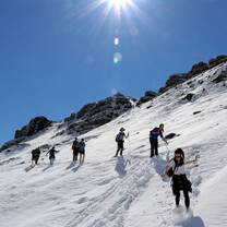 Mountain hiking with snow