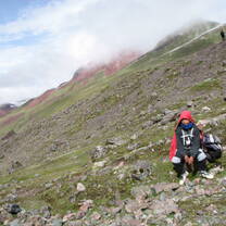 Rubendario sits on a rock