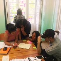 women in classroom at desk