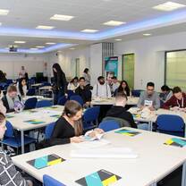 people inside the room sitting