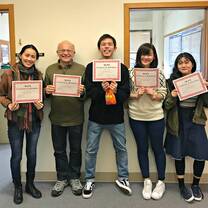 students with school certificates 