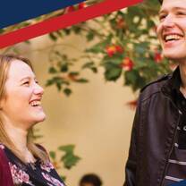 man and woman laughing