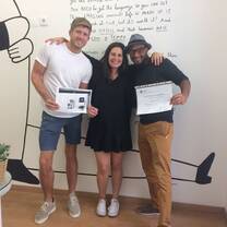 Two boys and one girl standing 