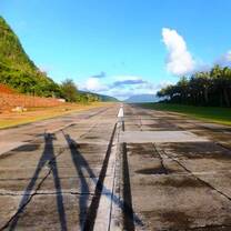 Airplane runway in Ofu with jumping shadows